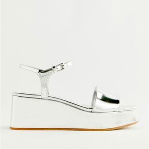 Reformation “Zora” silver platform sandals. Never worn, still in packaging.